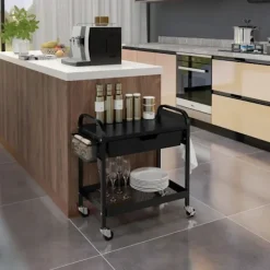 Rootz Living Köksö>Rootz Köksvagn - 1 låda - Sidokrokar - 1 Hylla - 4 Hjul - Liten korg - Multifunktionsvagn - Plast+stål - Svart - 61L x 32,6W x 58,5Hcm