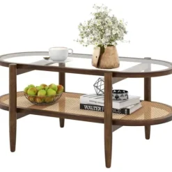 COSTWAY Soffbord>Soffbord med 2 nivåer , Ovalt träsoffbord med hylla i PE-rotang, Tempererat glasbordsskiva, 102 x 56 x 47 cm